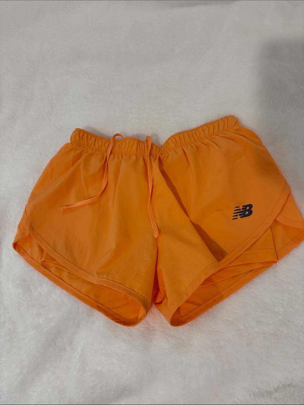 New Balance Women’s Bright Orange Athletic Shorts with NB Logo